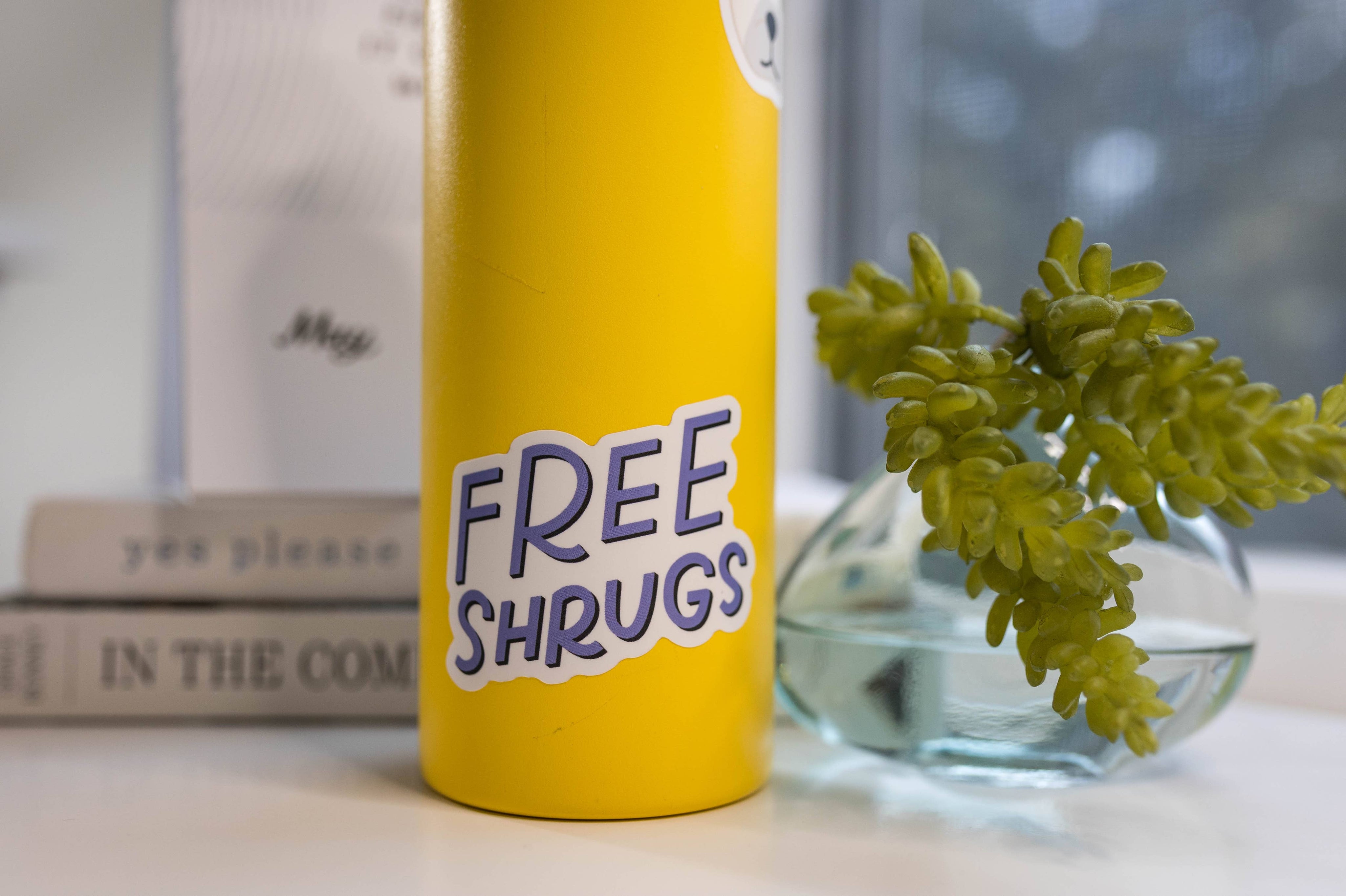 Free Shrugs Sticker