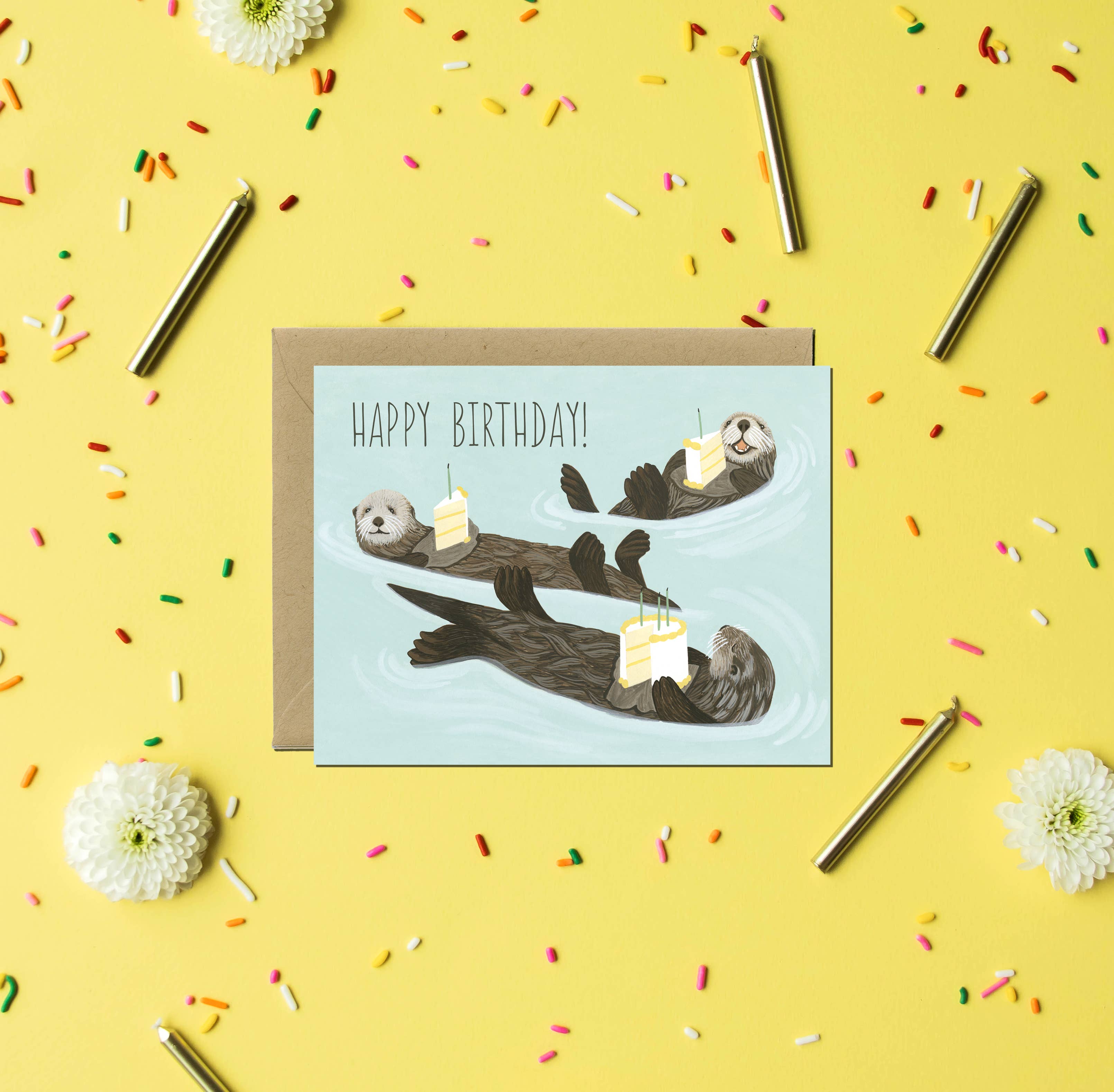 Otters Holding Cake Birthday Card